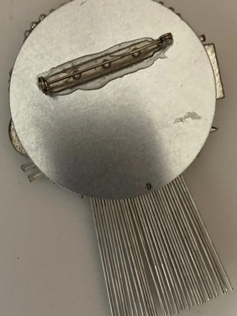 ONE OF A KIND BROOCH MADE FROM ASSORTED SILVER FINDINGS-LOCALY MADE IN USA